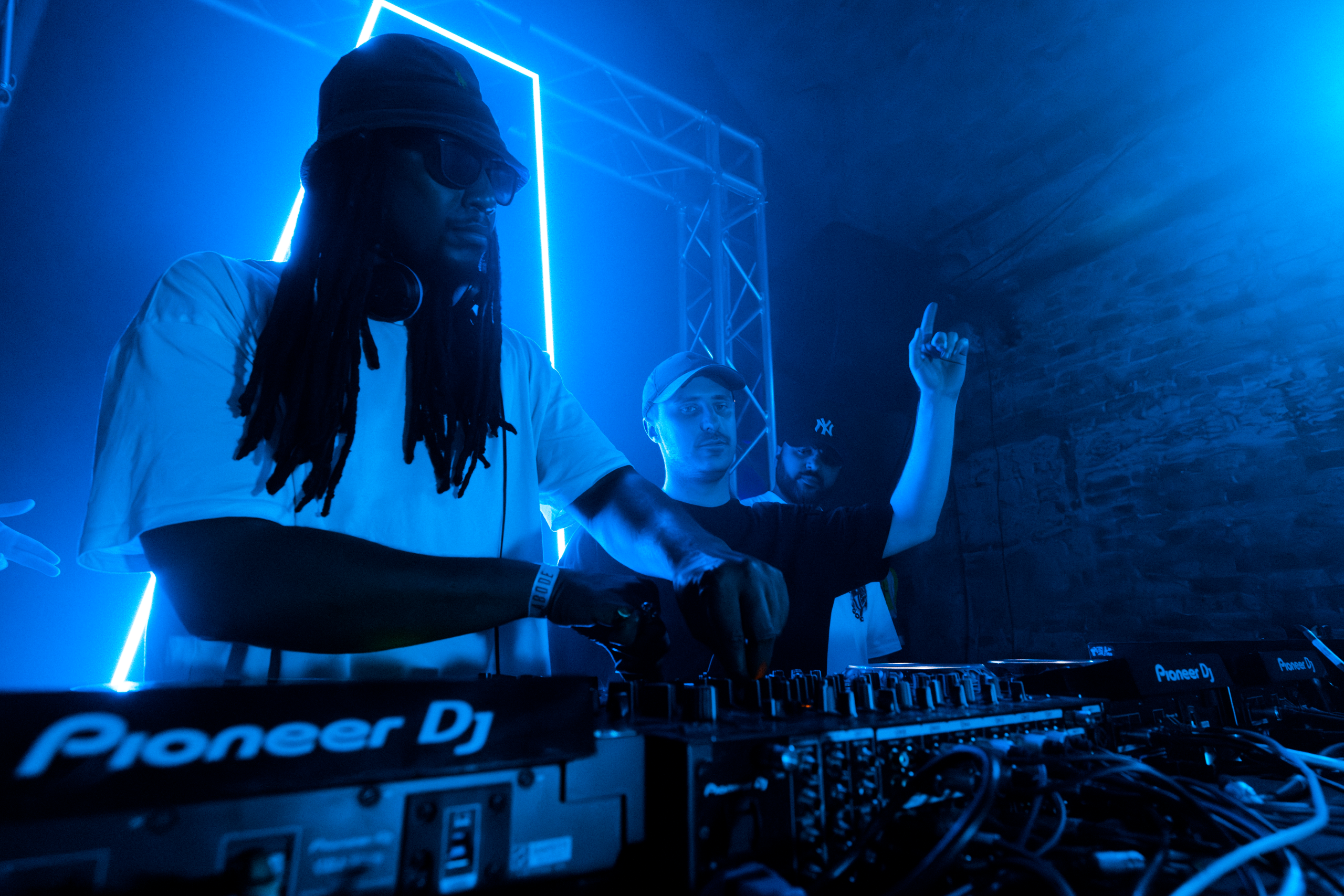 Mas Fuego DJ Collective and Producers playing music at event